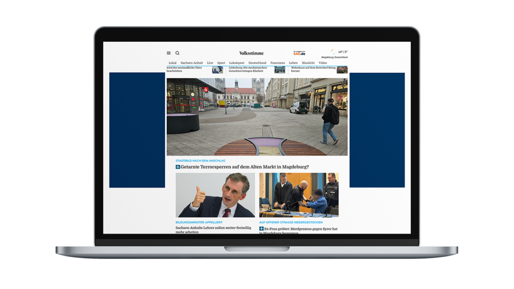 Laptop Mockup mit der Webseite der "Volksstimme" und einem eingezeichneten Bereich für eine Bannerwerbung Links und rechts.